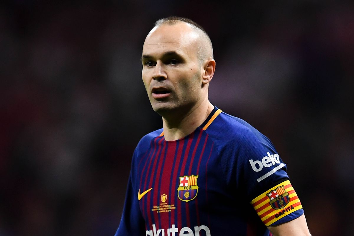 How tall is Andrés Iniesta?